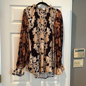 Black and gold flowing top